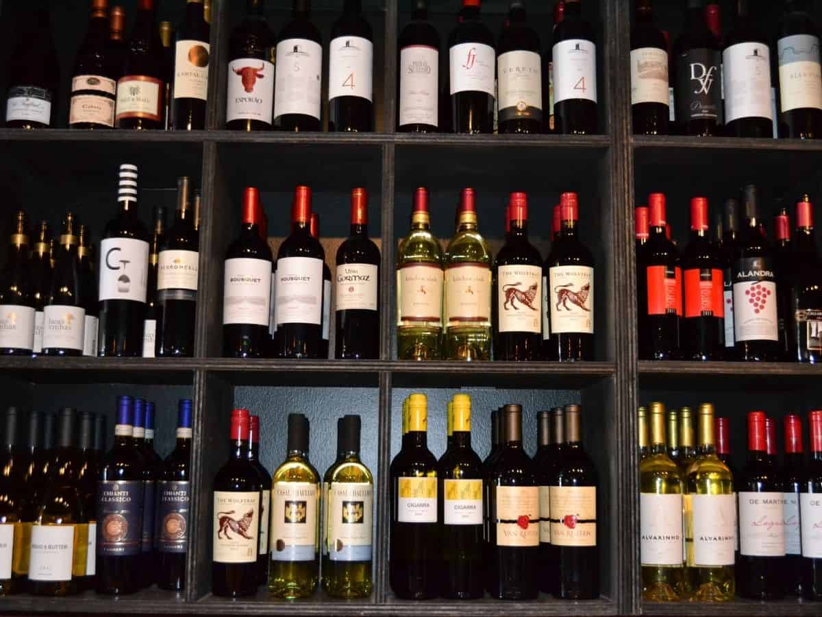 Wine bottles at a bar.