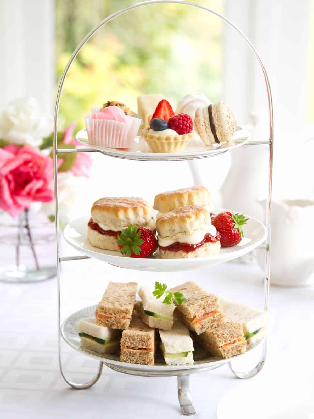 Tea party desserts on a tiered serving platter.