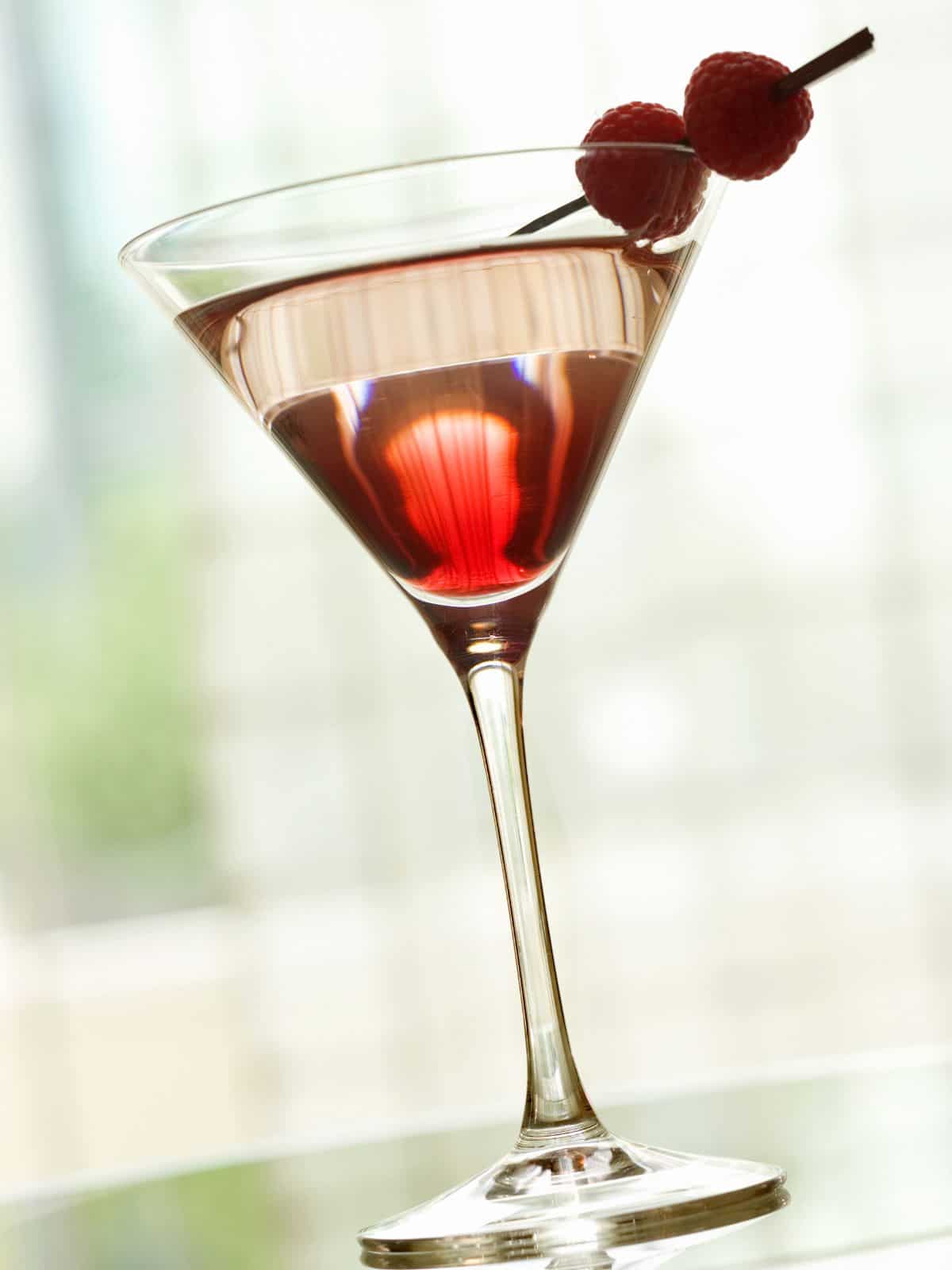 Chambord martini on table.