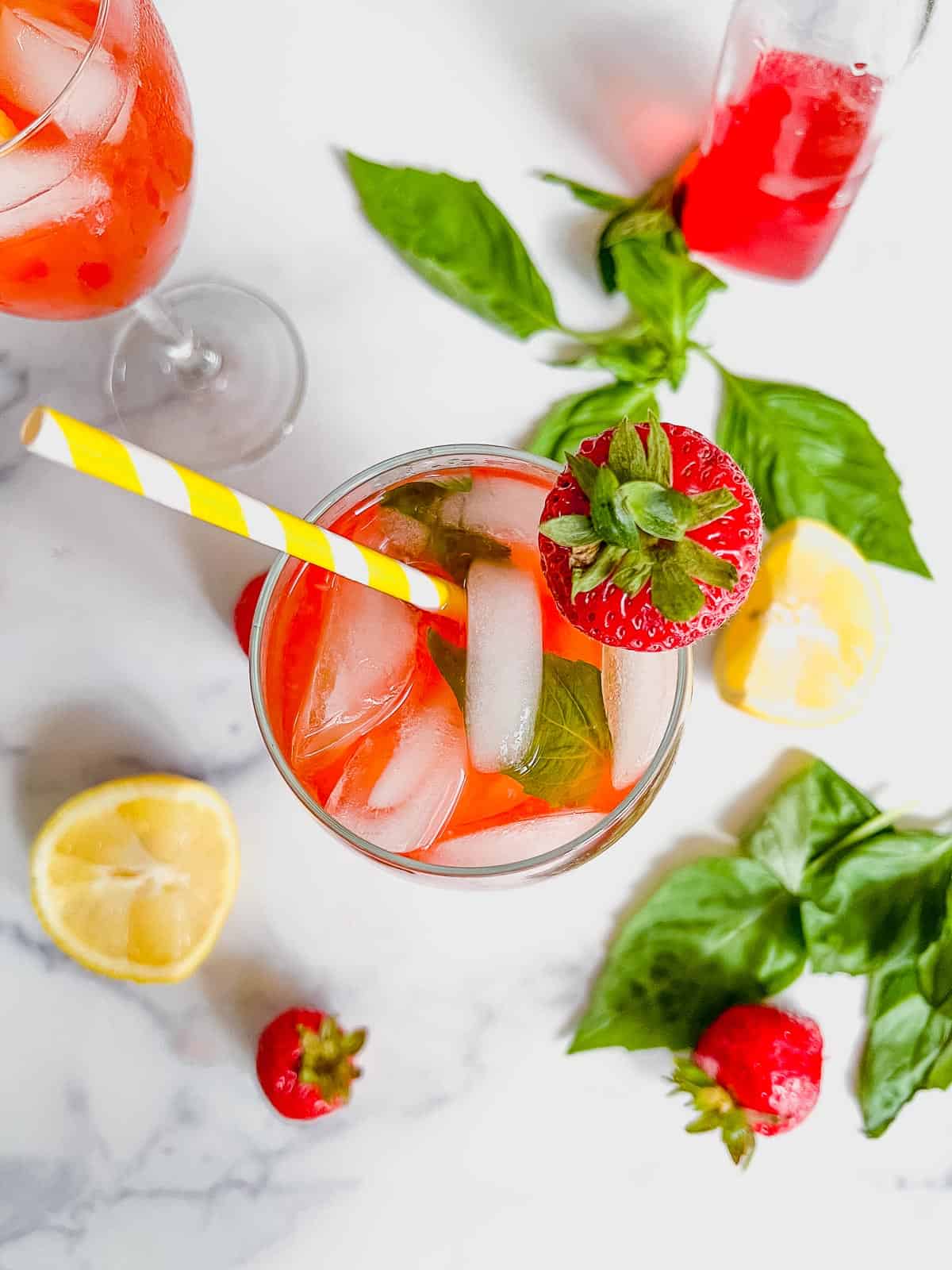 Birds eye view of strawberry basil lemonade.