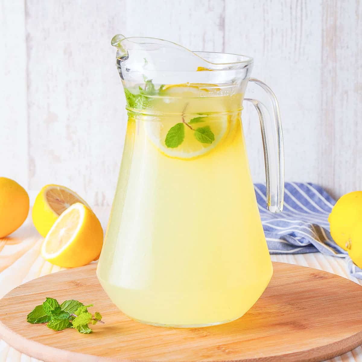 Pitcher of limoncello spritz with mint.