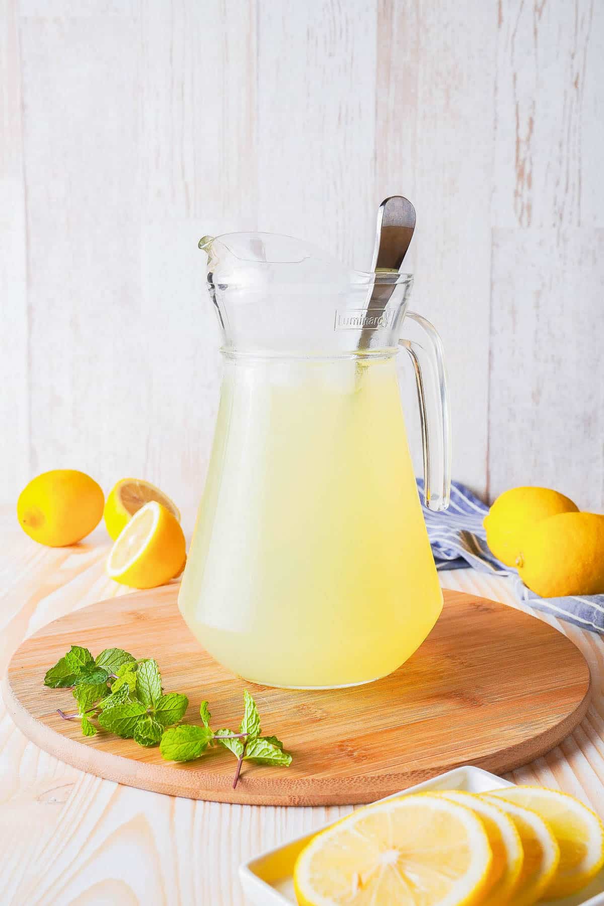 Limoncello spritz pitcher with spoon inside.