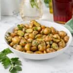 Herbed potato salad without mayonaisse in a bowl.