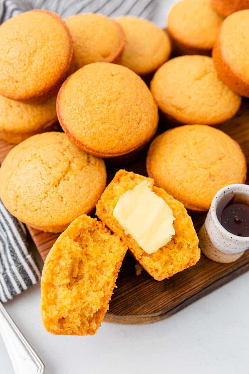 Mini cornbread muffins with butter.