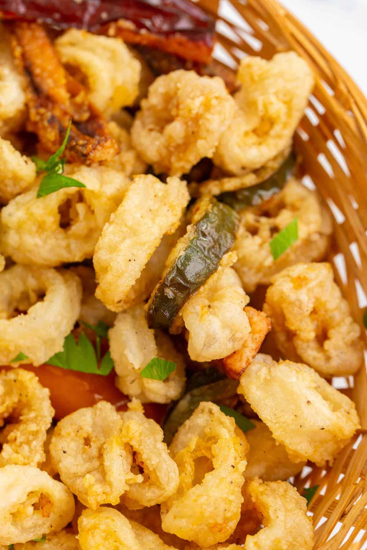 Fried crispy Italian calamari with peppers.