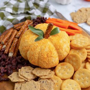 Pumpkin cheese ball apptizer dip shaped into a pumpkin.