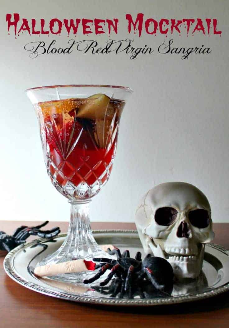 Bloody looking mocktail with a skull and spider. 