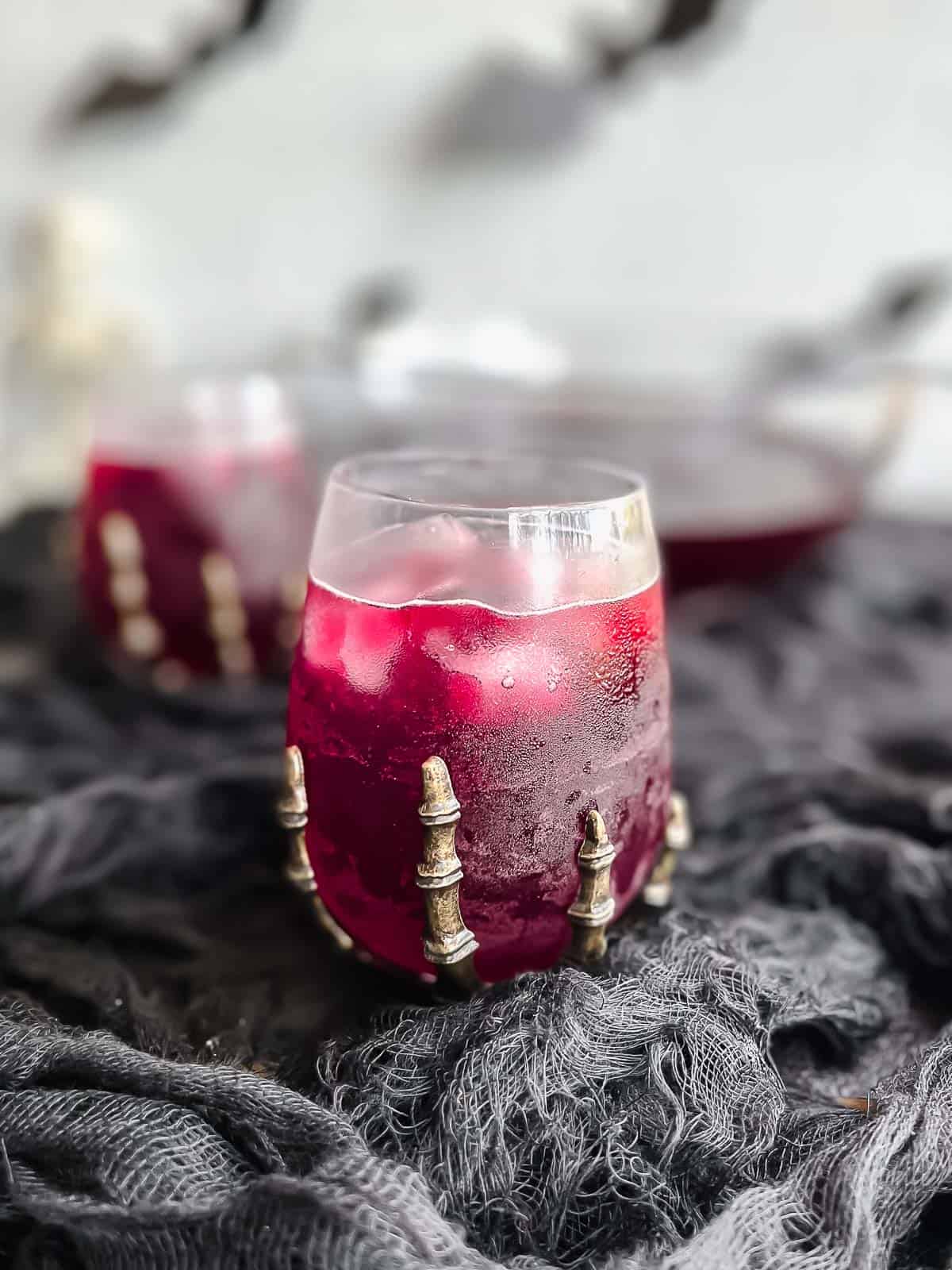Halloween party punch in glass on table.