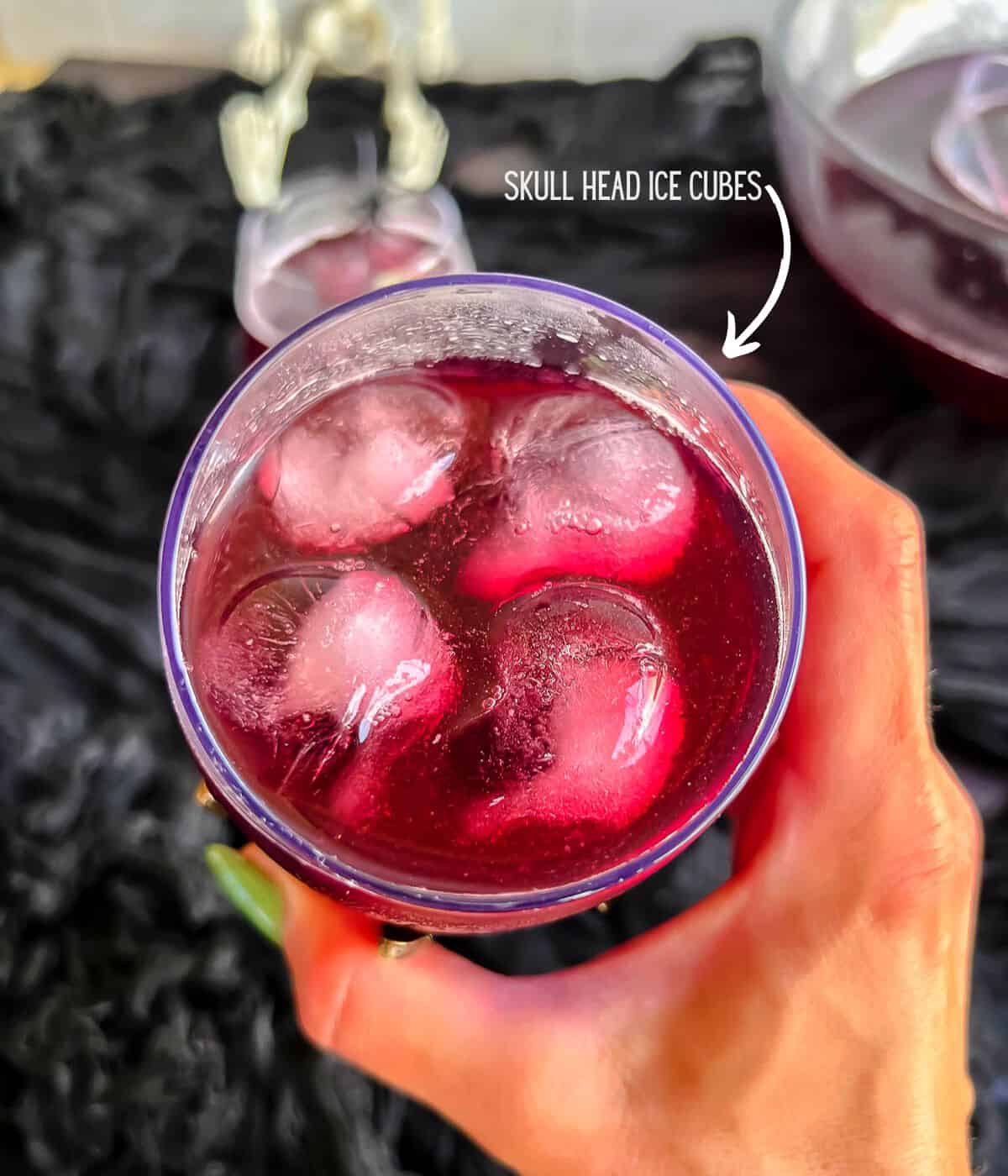 Showing skull ice cubes in punch glass.