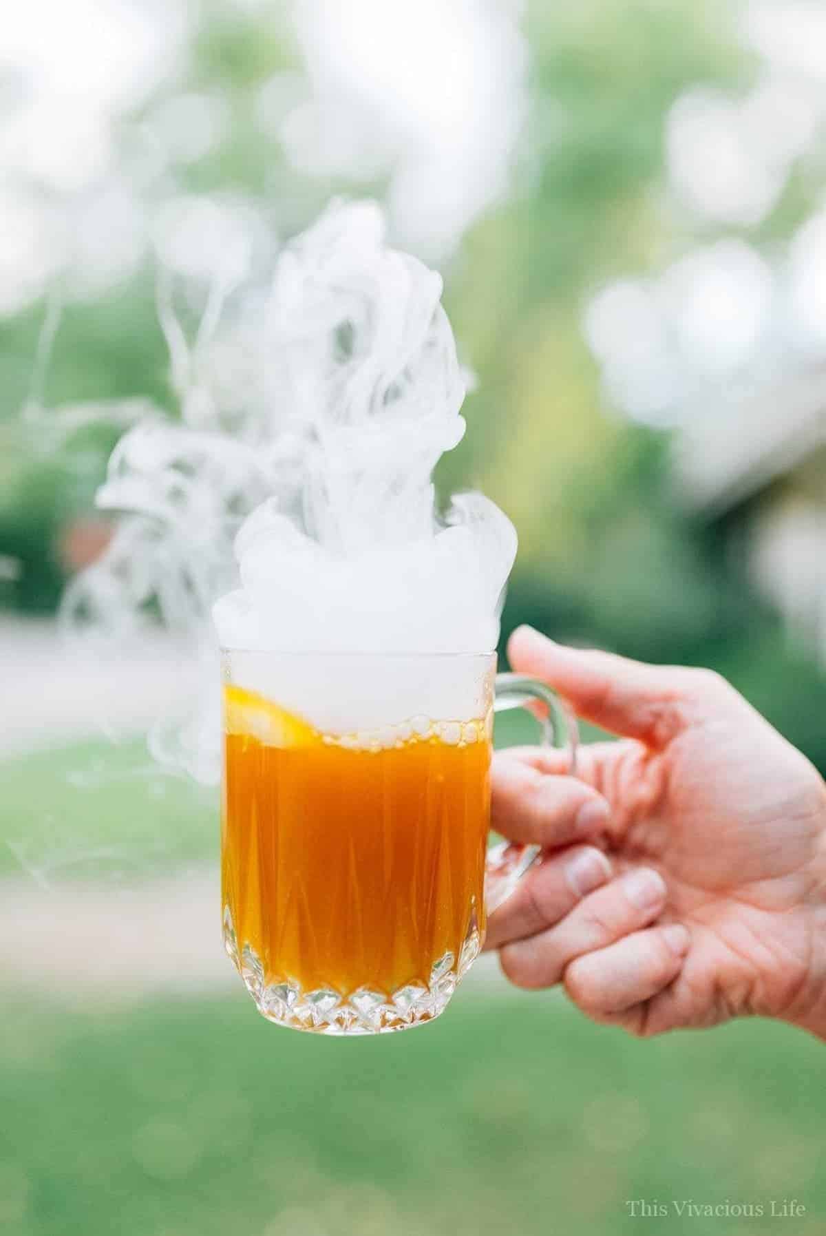 Smoking halloween drink in a mug.