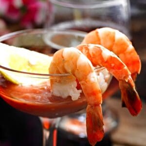 Shrimp cocktail in a cup.