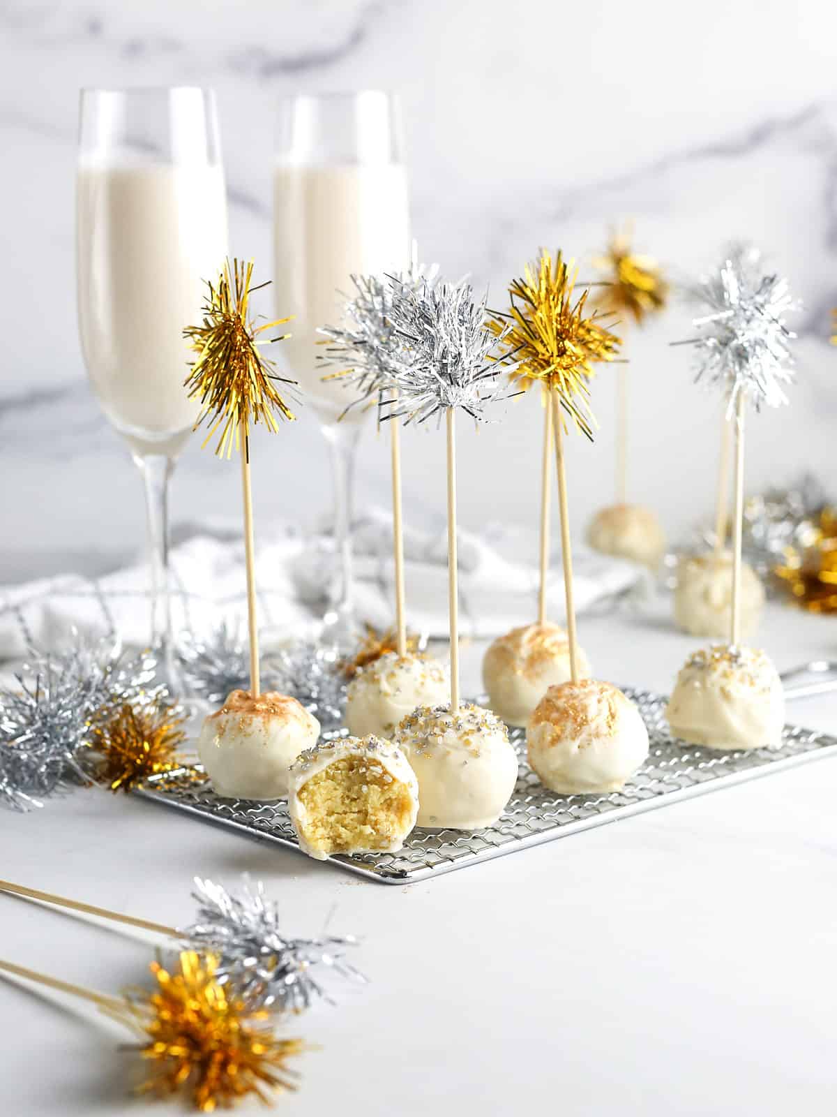 Cake balls on table with New Years decor.