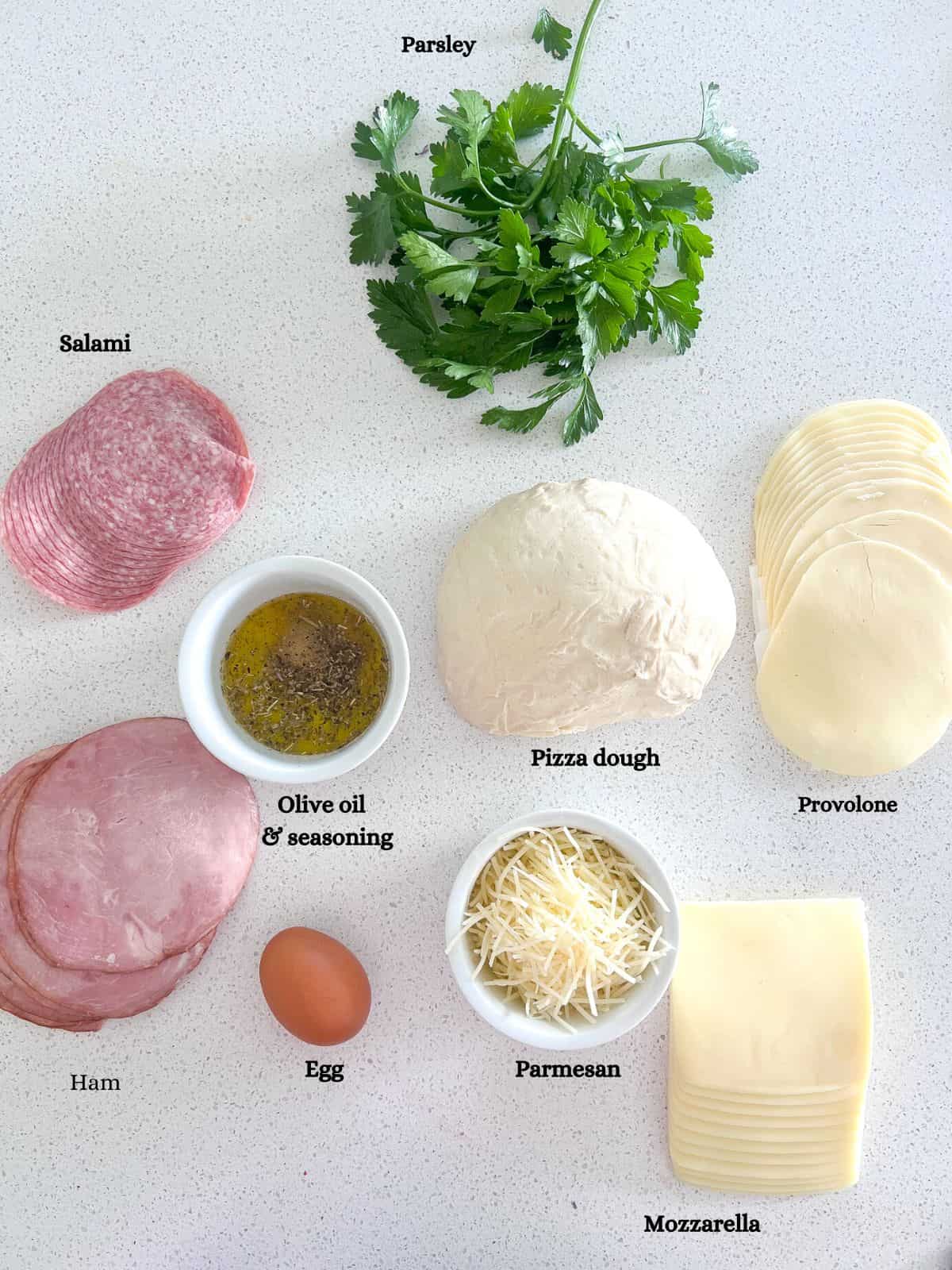 Ingredients on table to make stromboli.