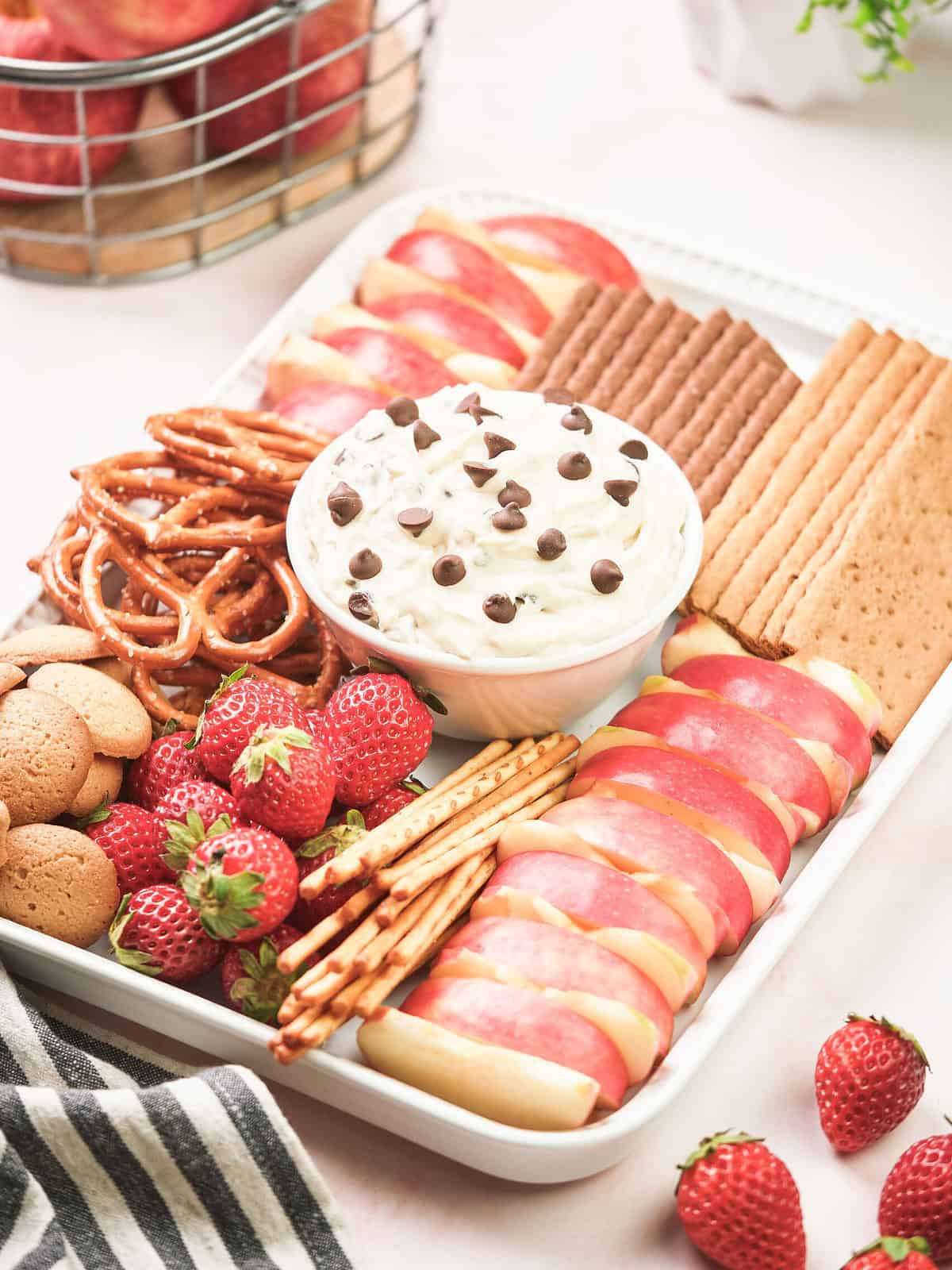 Chocolate chip dip with strawberries, graham crackers and pretzels.