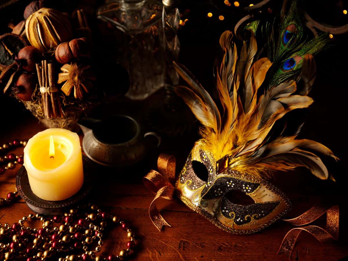 Masks and candles at a party.