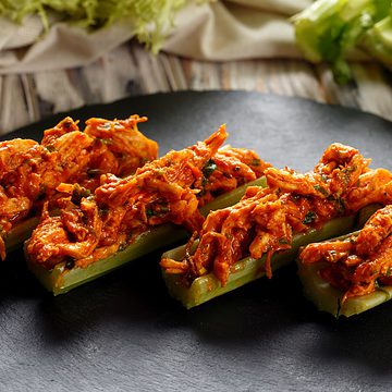 Stuffed celery sticks on table.