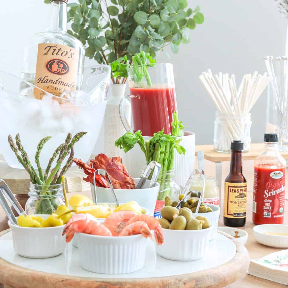 Bloody mary bar idea with condiments on the side.