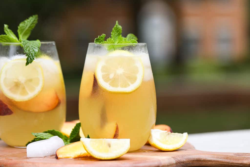 White wine spritzer with lemon and mint.