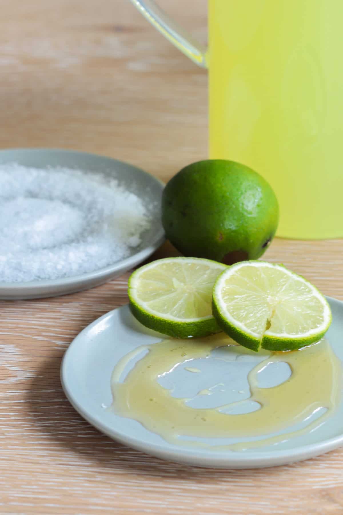 Lime and honey on plate.