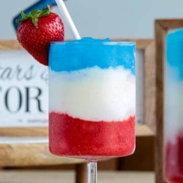 Fourth of July drink with red white and blue layers.