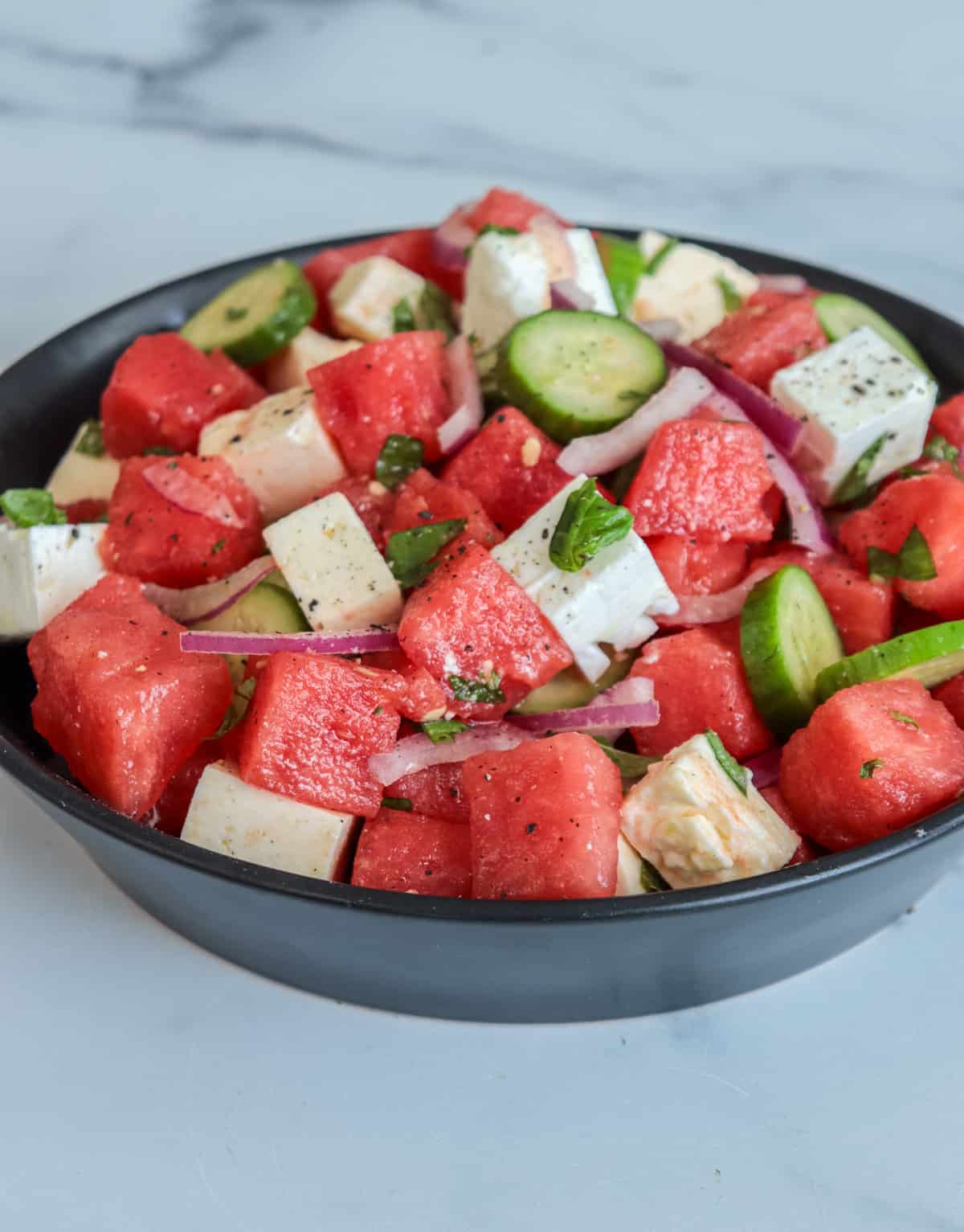 Watermelon feta cheese salad in a bowl.