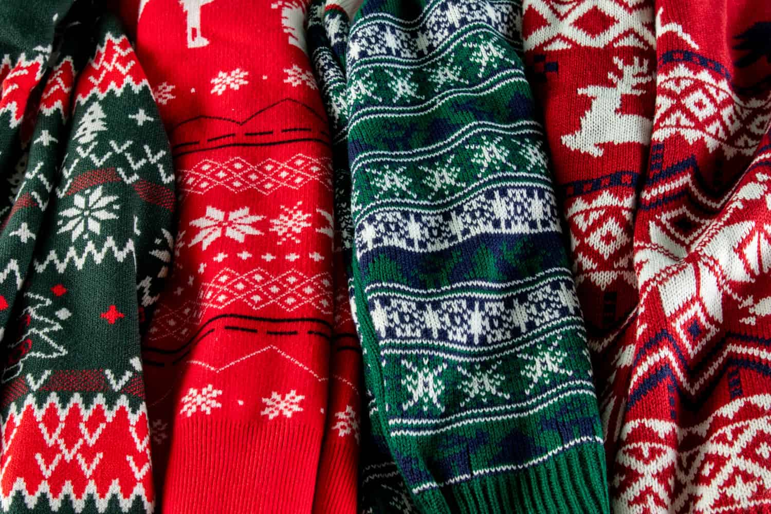 top-view-christmas-sweaters-arrangement.