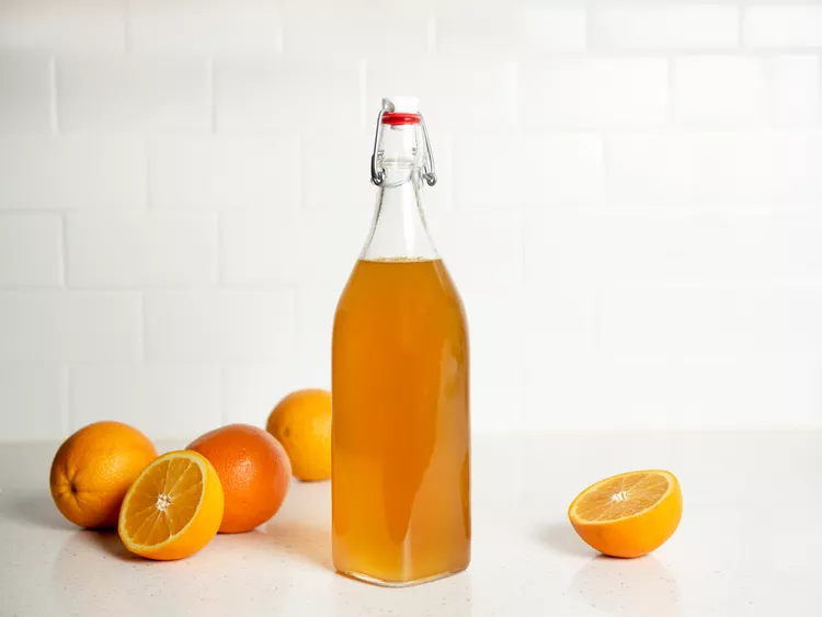 bottle of orange simple syrup.