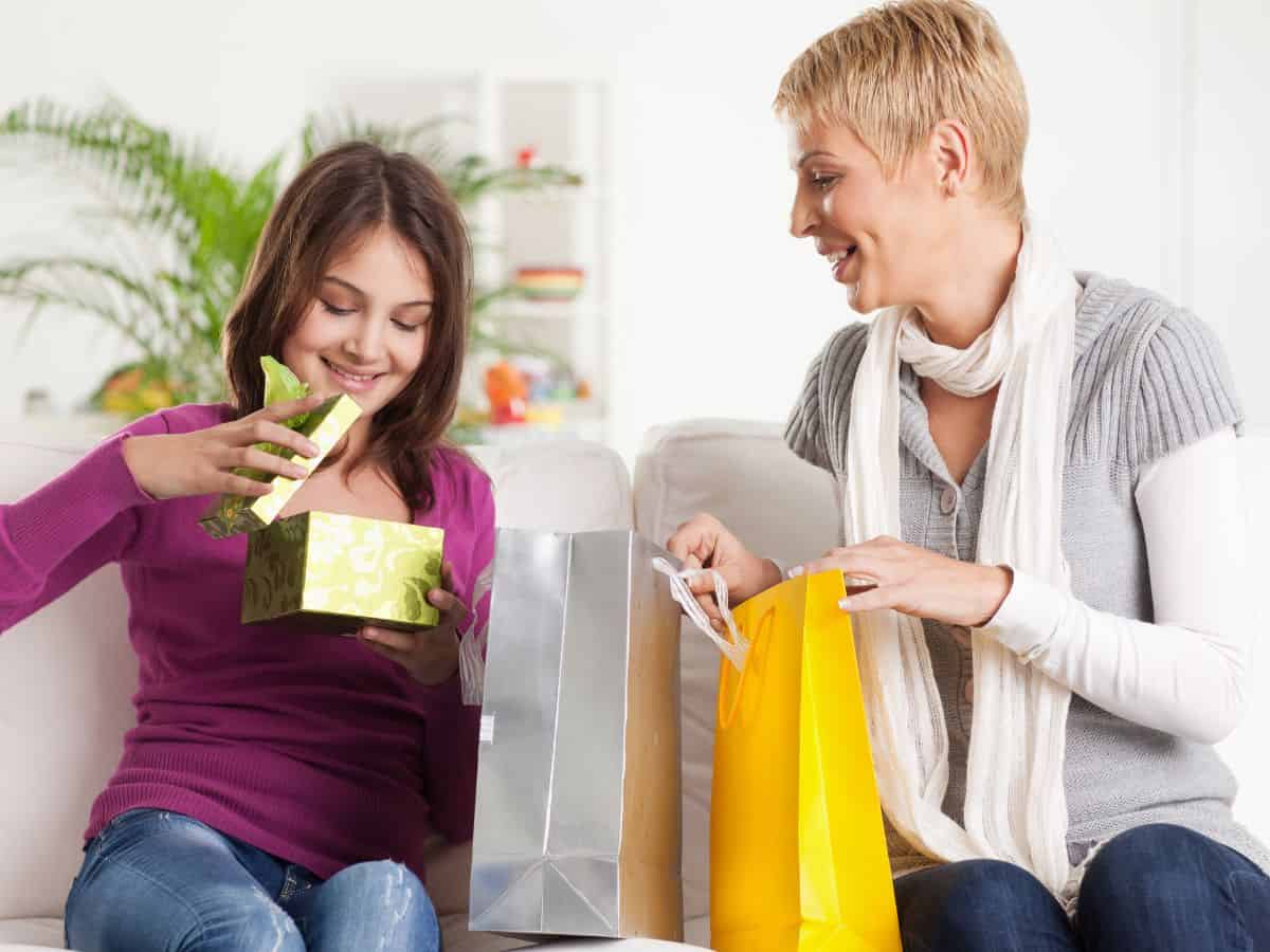 Womens exchanging gifts.