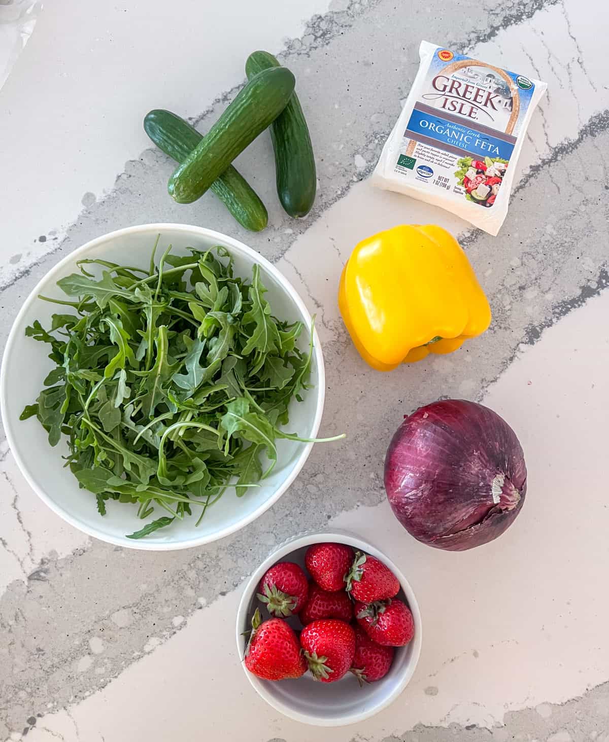 Arugula strawberry salad ingredients.