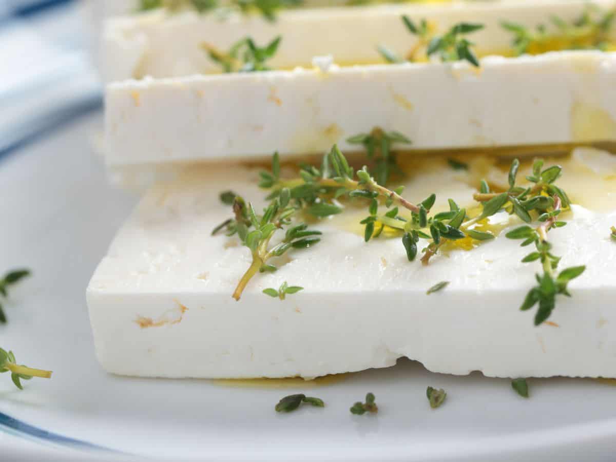 Feta cheese blocks with thyme.