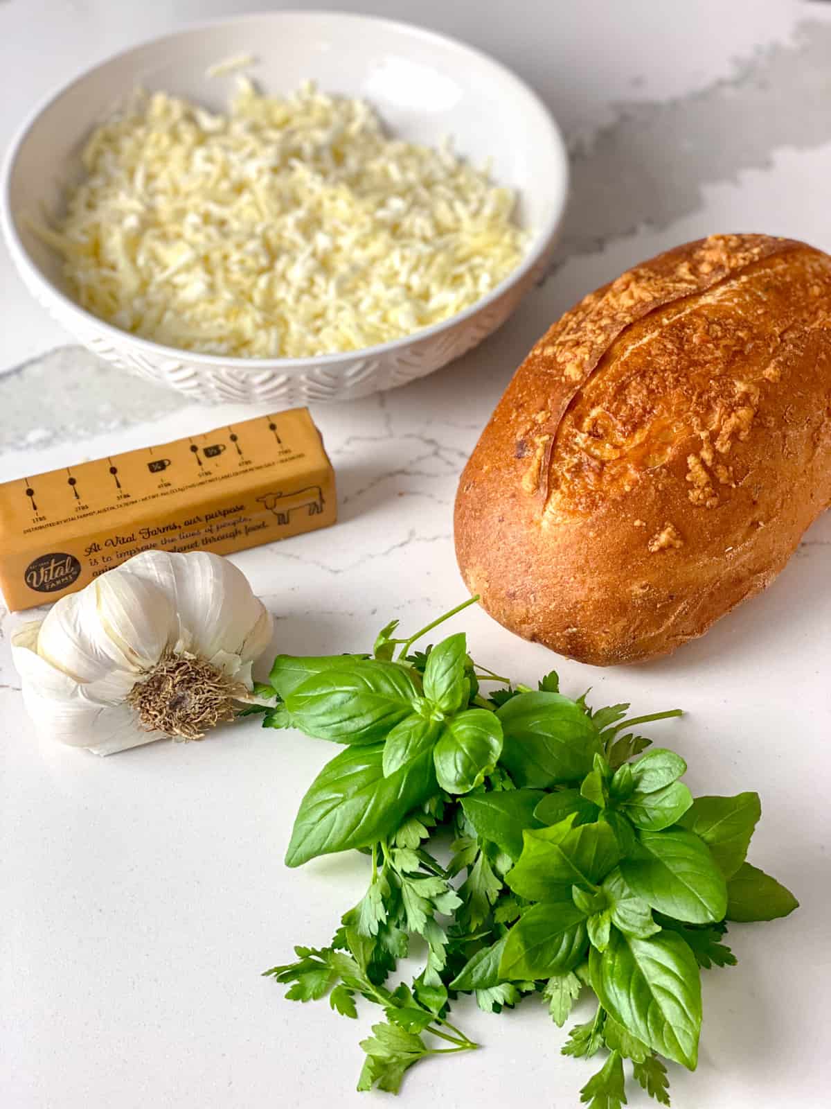 Ingredients to make cheesy pull apart bread.