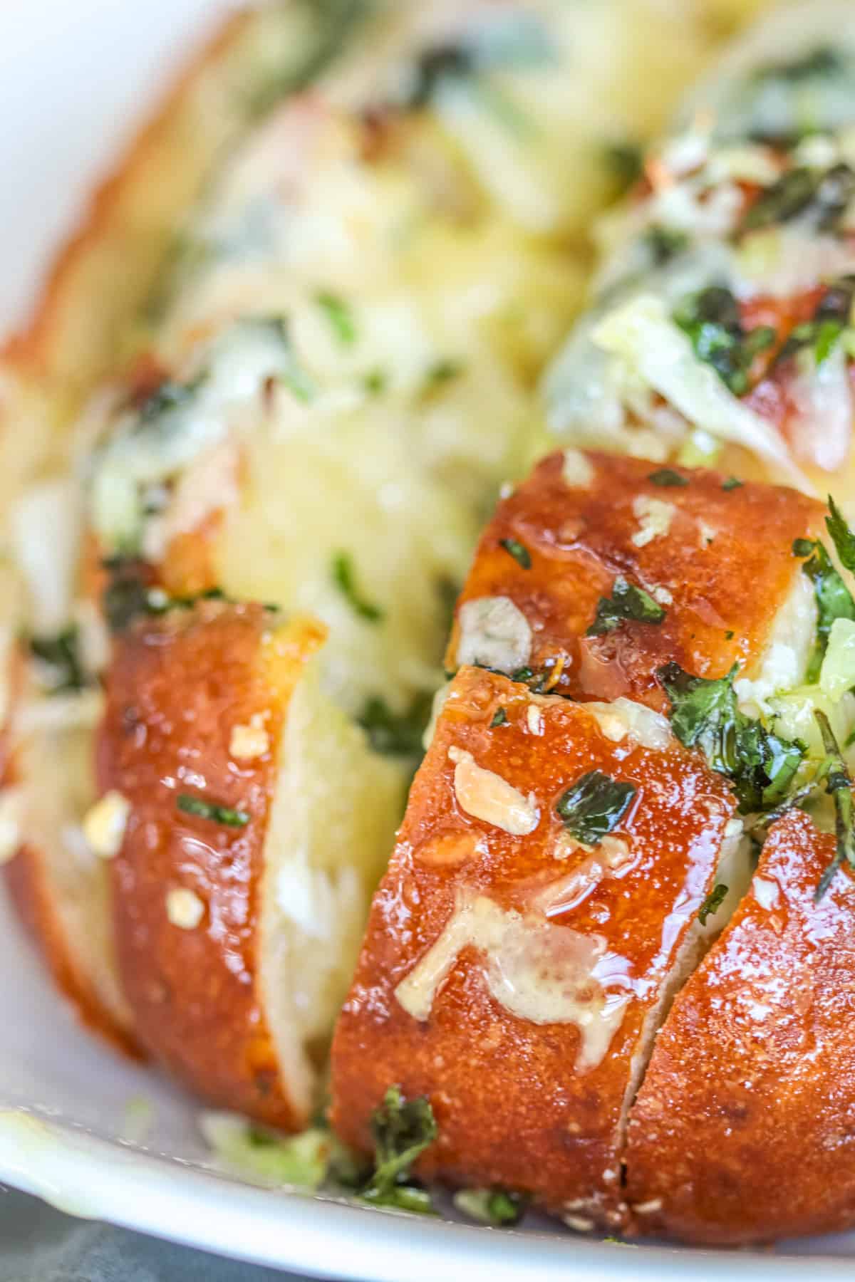 Cheesy garlic pull apart bread close up.