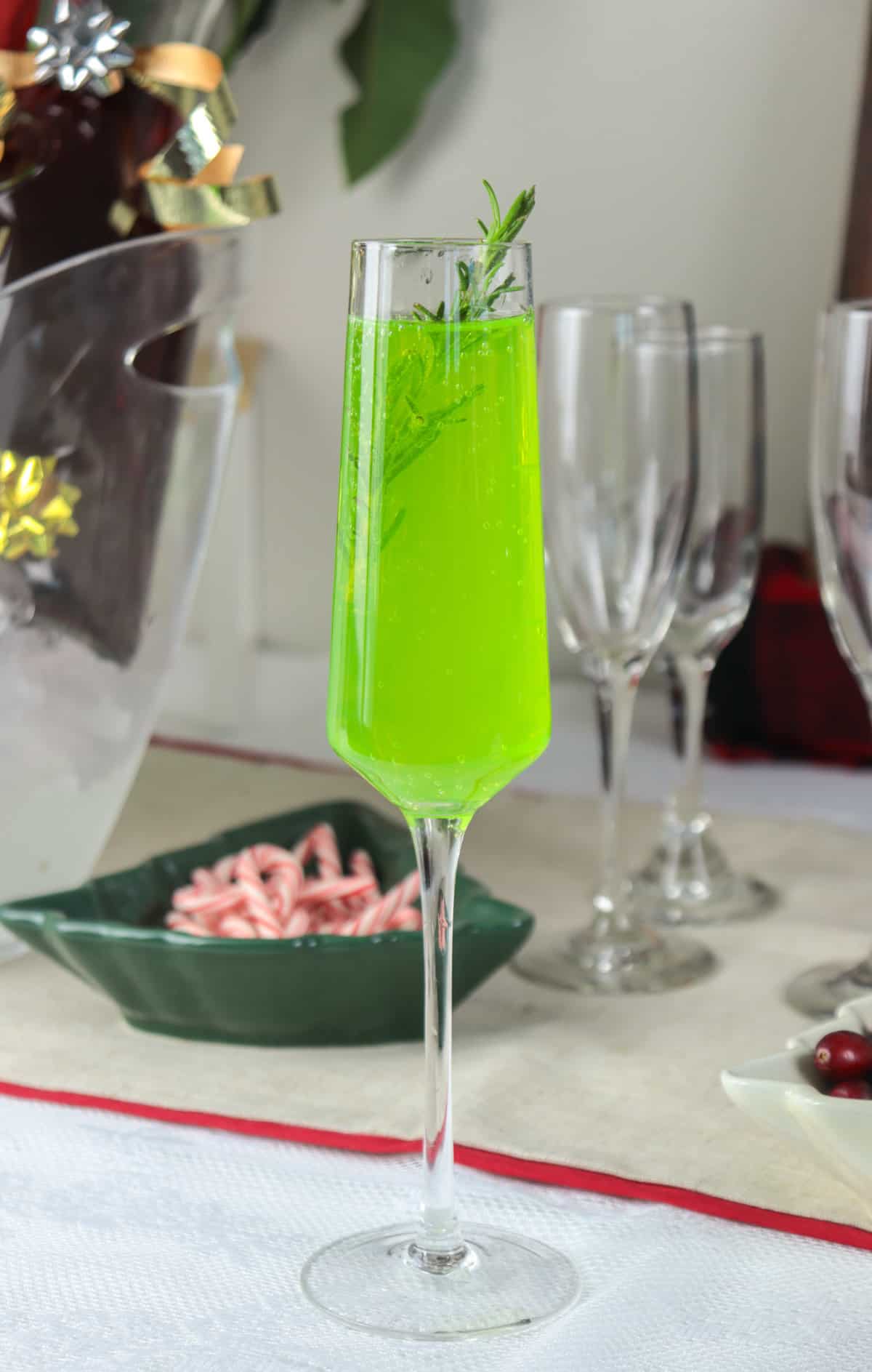 Green mimosa in a champagne glass.