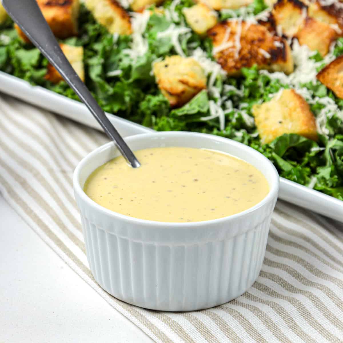 Caesar dressing in a bowl.