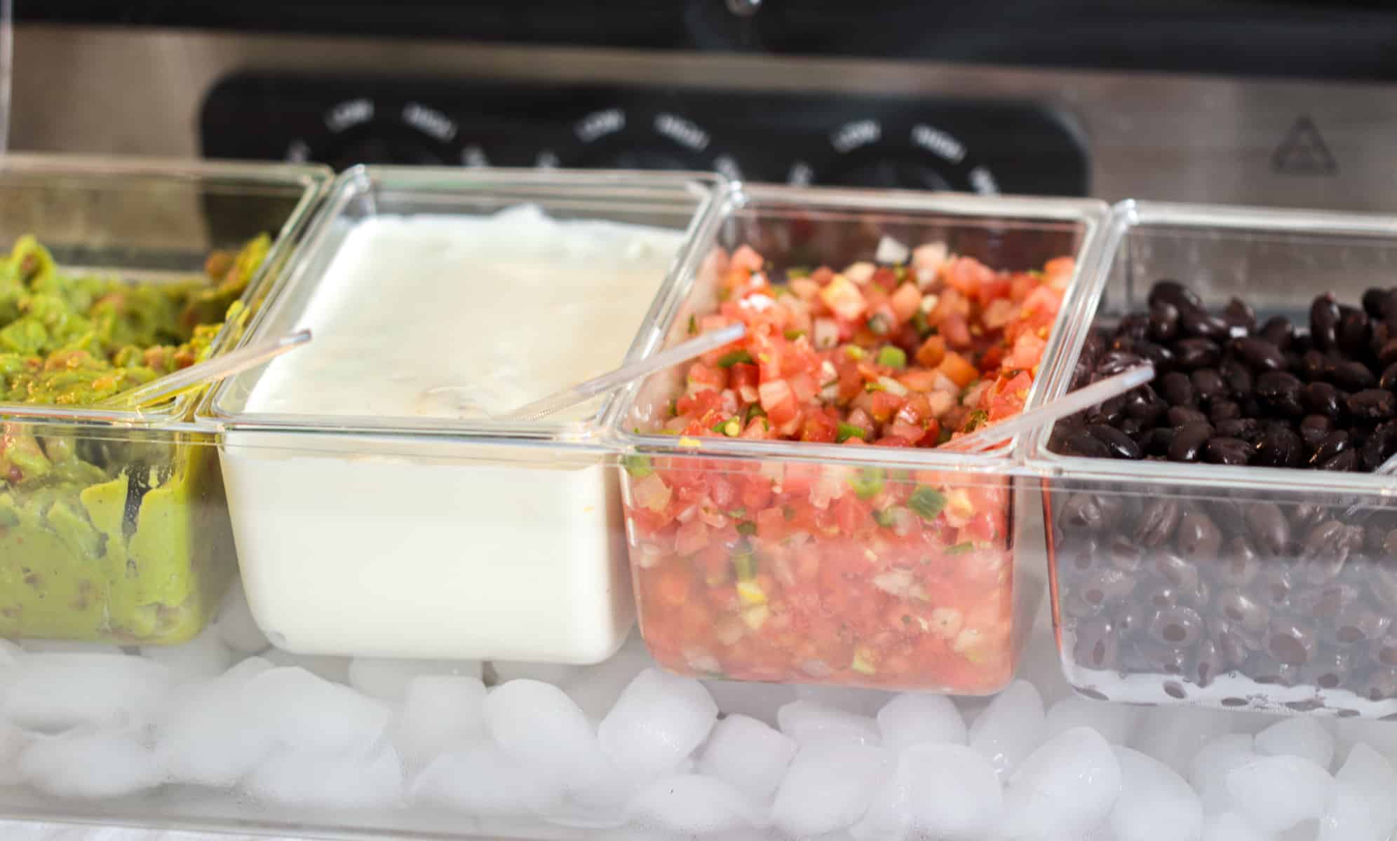 Condiments in a condiment holder.