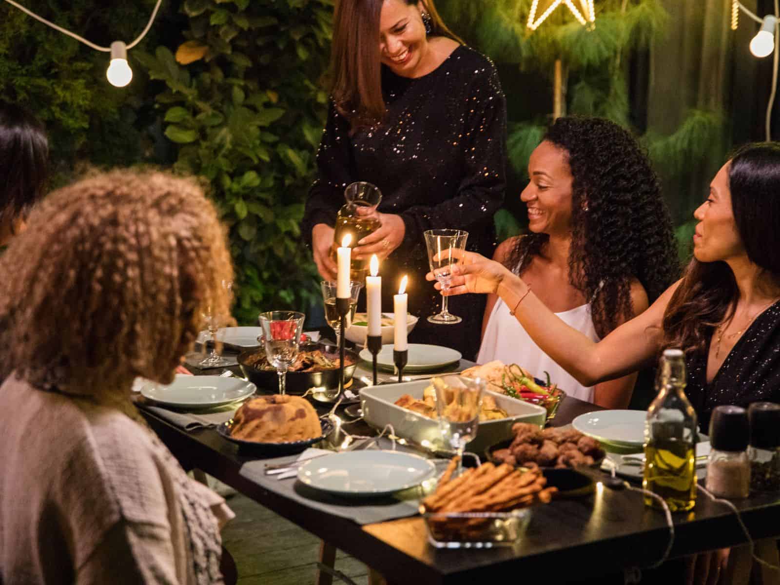 Guests sitting at a table for dinner.