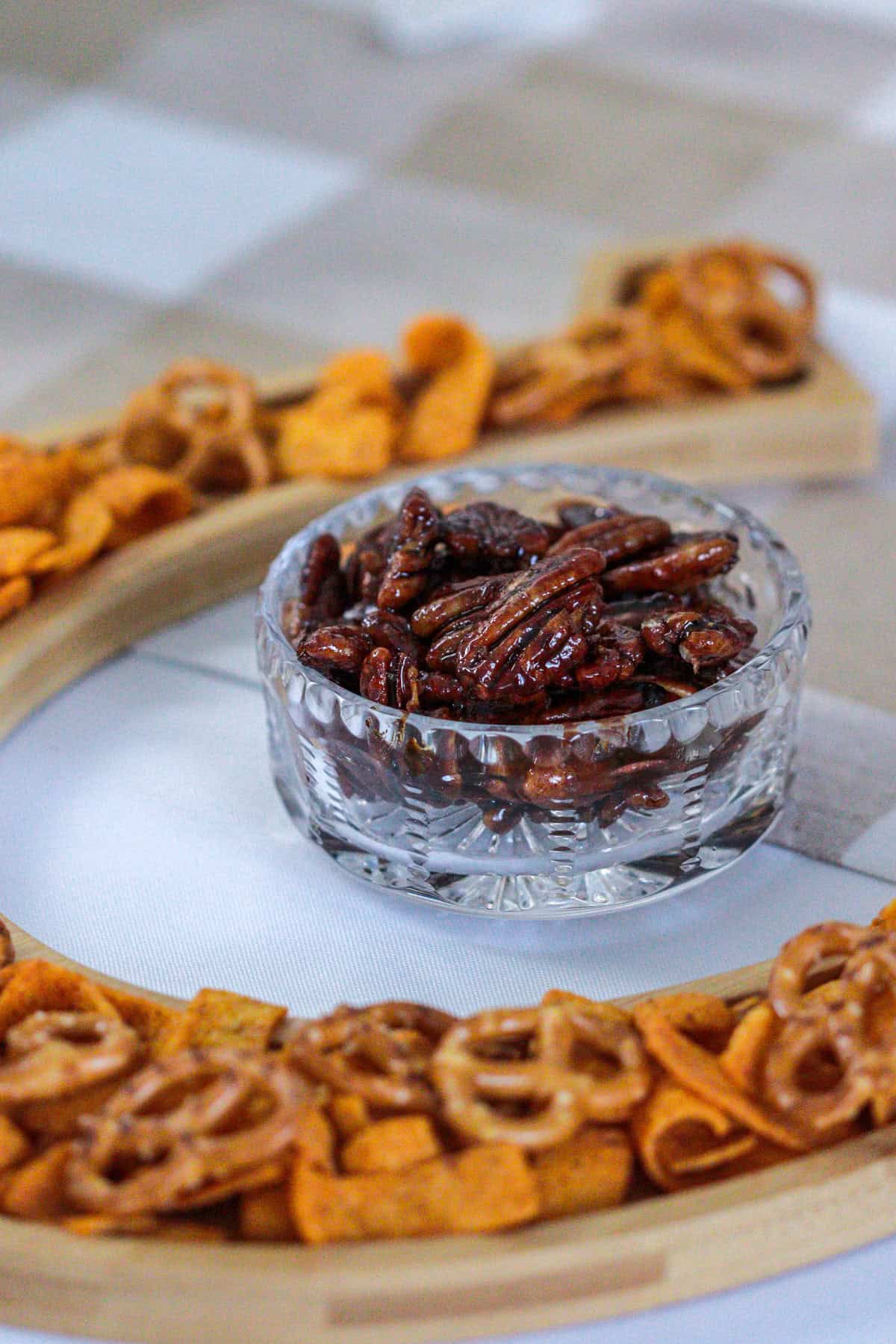 Candied pecans with horseshoe snacks.