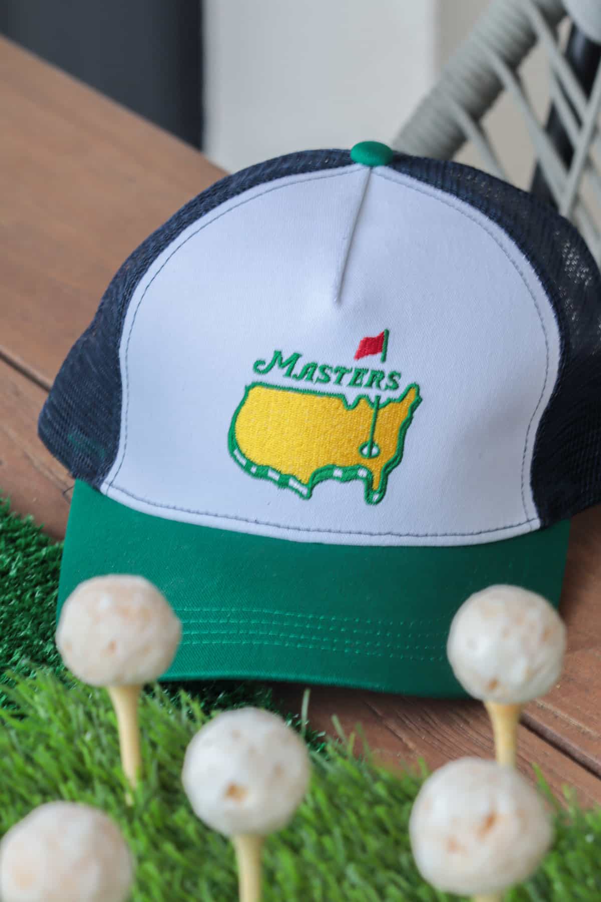 Masters hat on table.