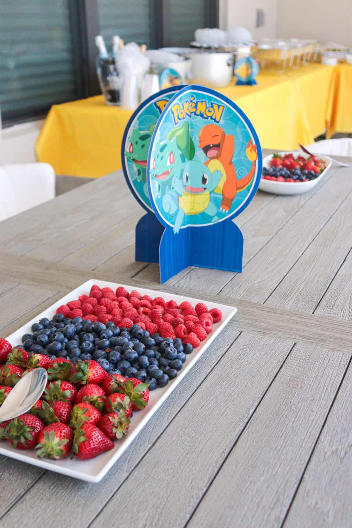 Pokeball red and blue fruit plate for party.