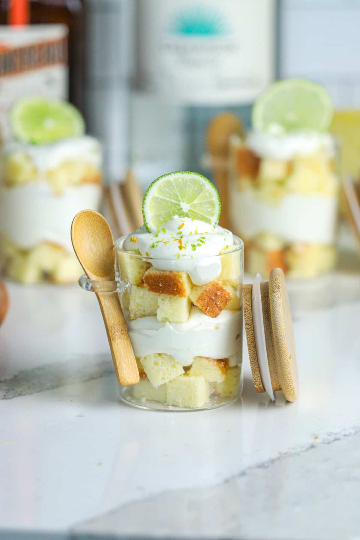 Margarita trifle cakes with lime wheel.
