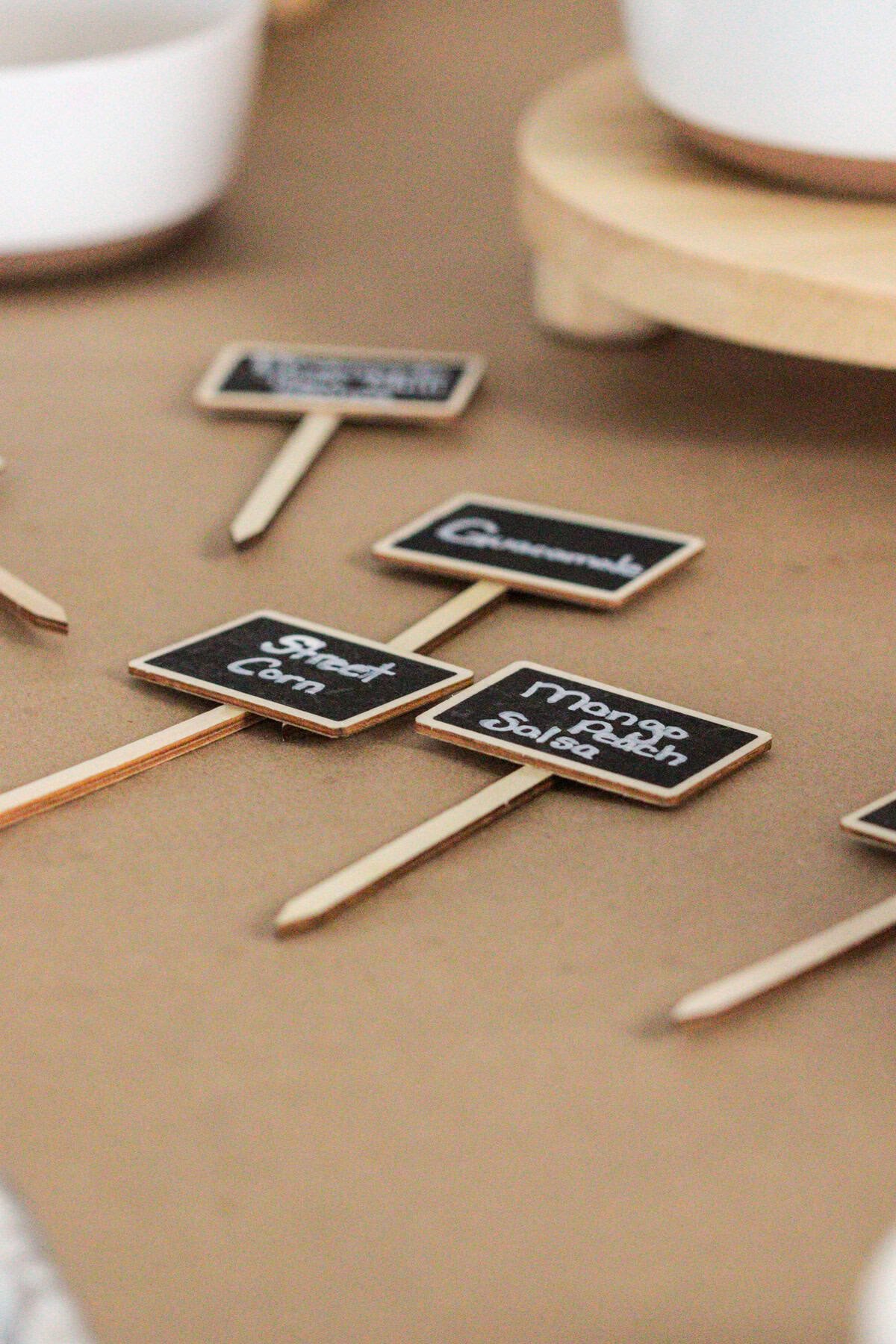 Mini chalkboard signs for chips and salsa bar.