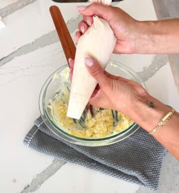 Filling in a piping bag.