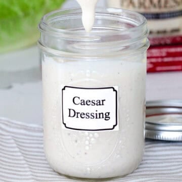 Jar of hoemade ceasar dressing.