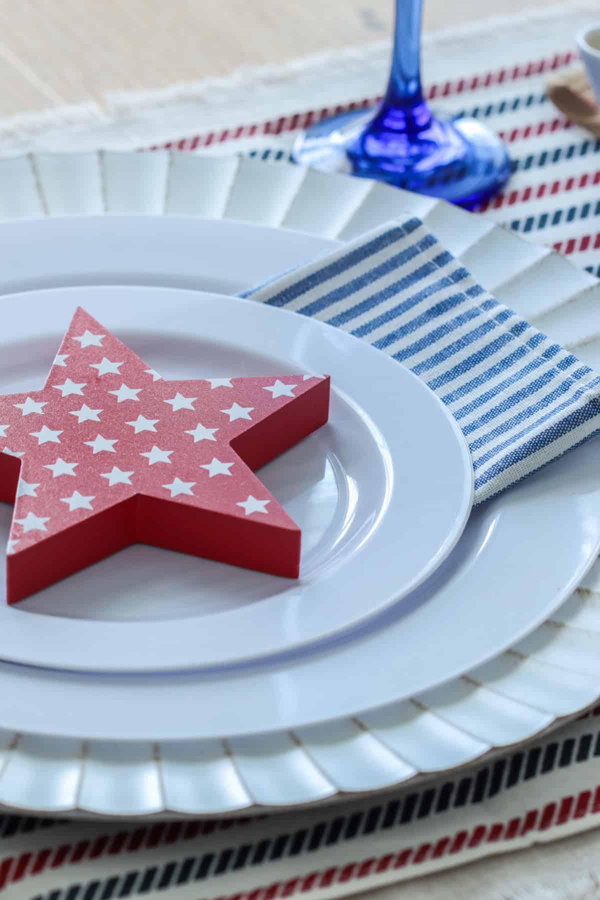 Close up of place setting with red star.