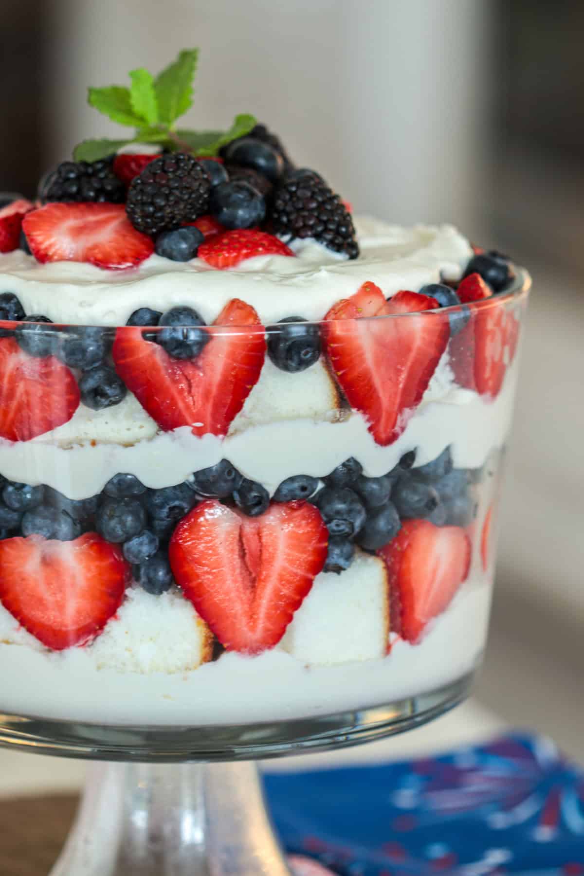 Close up of berry trifle in trifle dish.