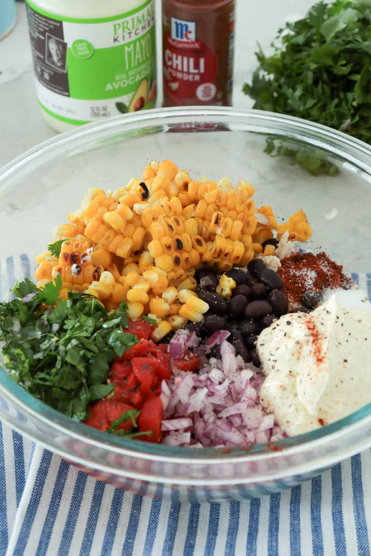 Bowl with Mexican chicken salad ingredients.