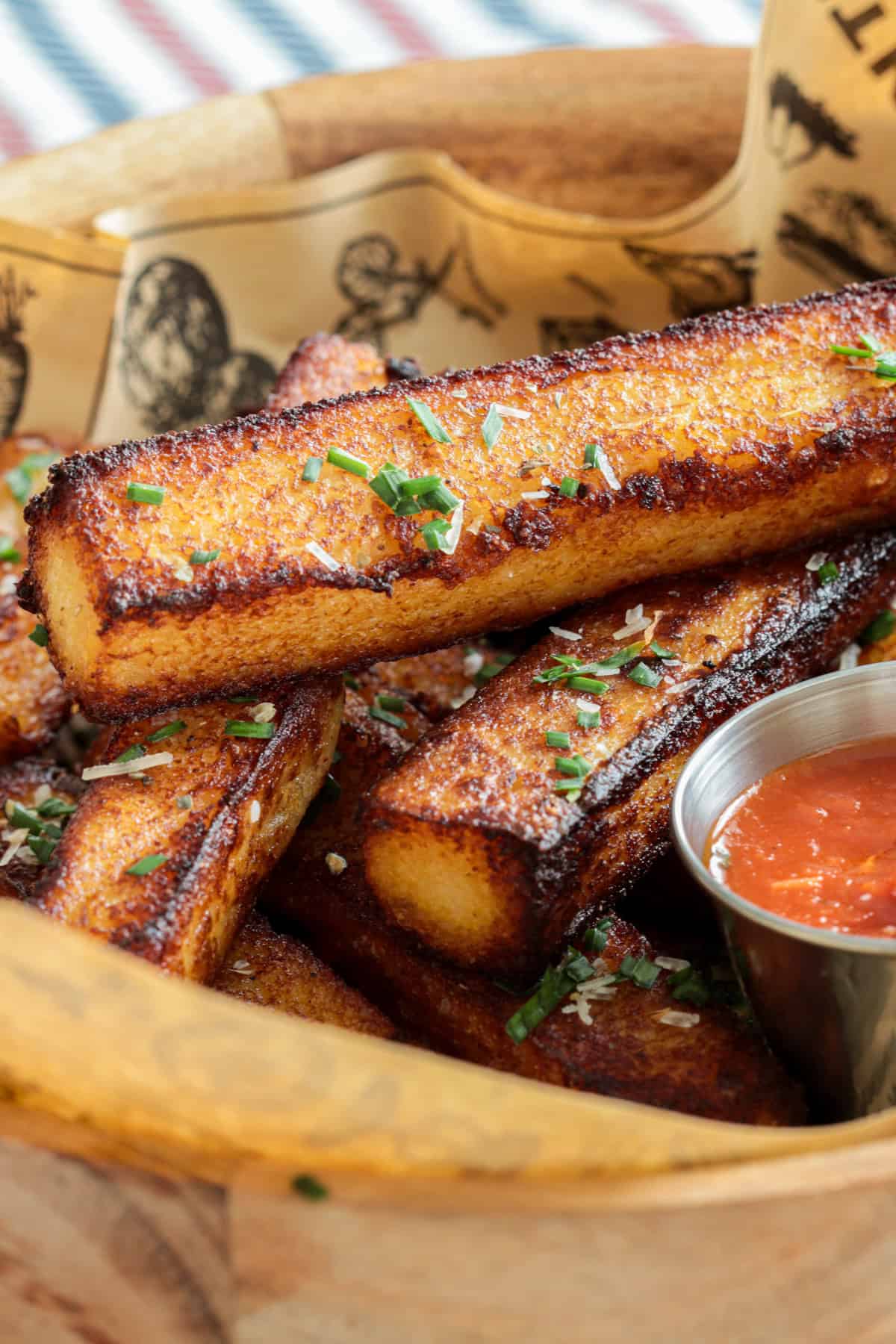 Polenta fries in a basket.