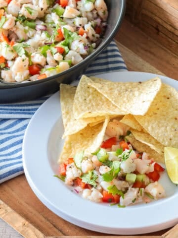 Shrimp ceviche in a bowl with chips.