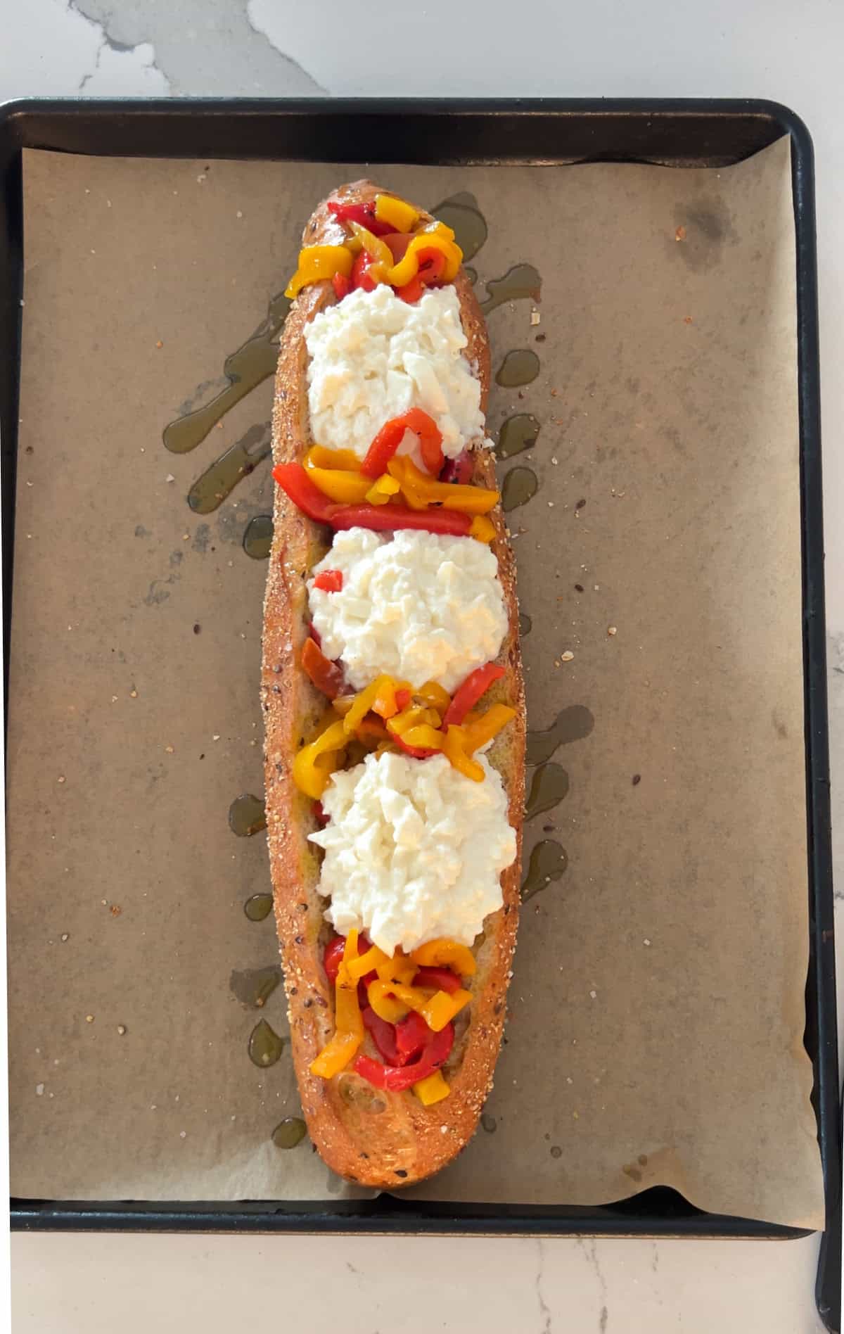 Stuffed bread with roasted peppers and burrata cheese.