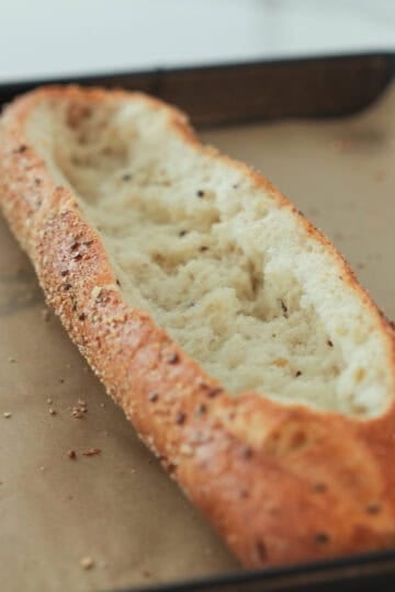 Sliced french bread loaf.